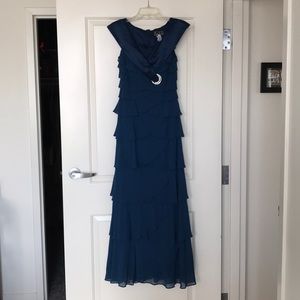 Navy blue floor length gown with ruffles